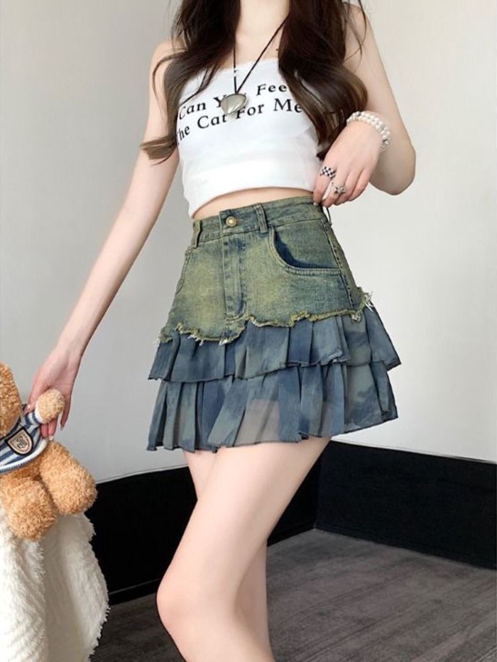 Chân váy denim nữ mùa hè viền thô không đều, lưng cao, chân váy chữ A thon gọn và ôm hông