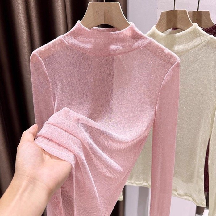 Áo sơ mi lưới nửa cổ cao màu trắng bạc dành cho nữ mùa thu váy treo rỗng có ren niche top
