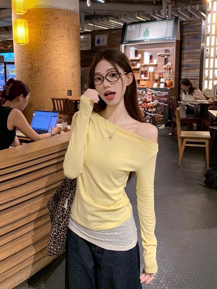 Áo sơ mi trễ vai hai dây giả màu vàng hàn quốc dành cho nữ đầu thu trễ vai xu hướng áo trễ vai cay