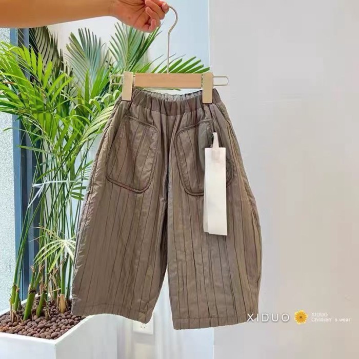 Quần áo trẻ em Hàn Quốc quần bé gái 25 mùa thu đông unisex plus nhung trẻ em dáng rộng sọc dọ