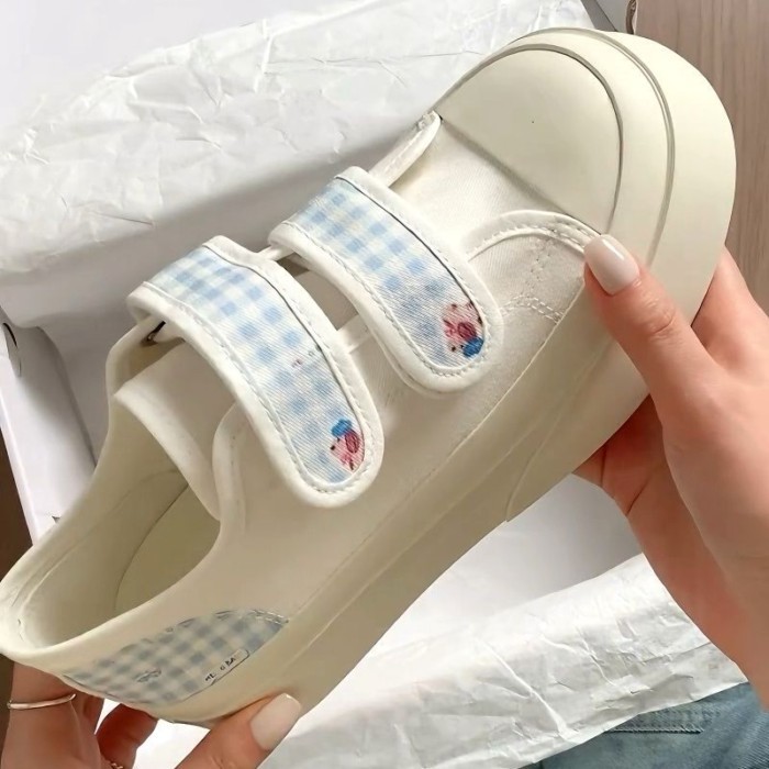 Giày canvas trắng đế dày đơn giản dành cho nữ sinh với chân váy và giày thể thao Velcro