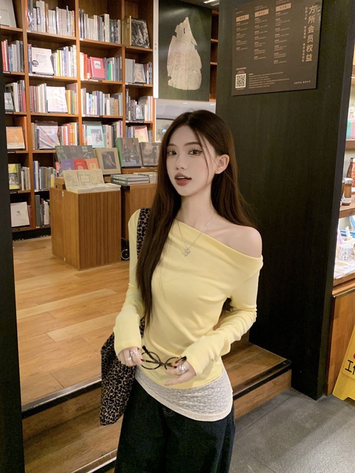 Áo sơ mi trễ vai hai dây giả màu vàng hàn quốc dành cho nữ đầu thu trễ vai xu hướng áo trễ vai cay