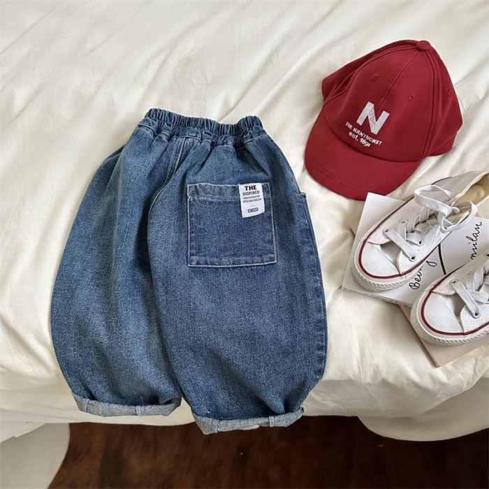 chiếc quần jeans trẻ em xuân thu quần ống rộng phong cách mới cho bé trai và bé gái quần harem ố