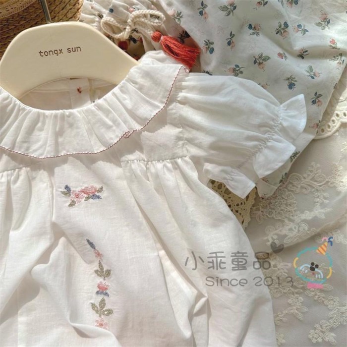 Nhẹ dễ mặc Áo mùa hè bé gái phong cách Hàn Quốc Áo thun babydoll tay phồng ngắn tay thêu ve á