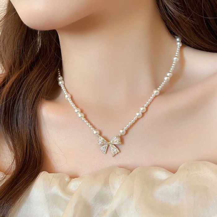 Bow Pendant Pearl Sweater Necklace Women's New High-end Light Luxury Niche Clavicle Necklace A