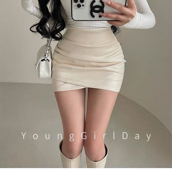Váy xếp ly màu đen không đều dành cho nữ mùa thu đông cao cấp bó sát hot girl da pu hông váy ngắ
