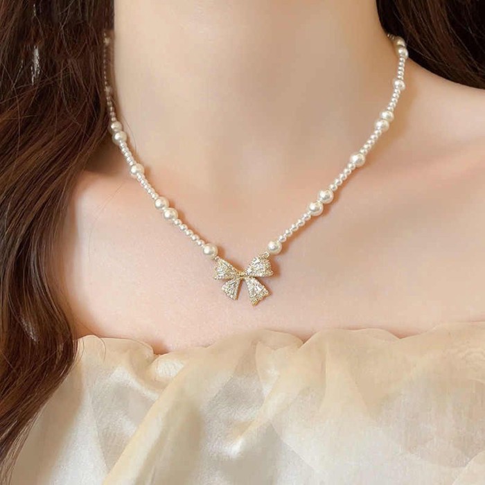 Bow Pendant Pearl Sweater Necklace Women's New High-end Light Luxury Niche Clavicle Necklace A