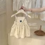 Quần áo trẻ em phong cách Hàn Quốc mùa hè bé gái phong cách mới tính khí thêu váy treo váy re