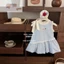 Váy vest bé gái phong cách Hàn Quốc nơ ngọt ngào kẻ sọc xanh váy nụ hoa dễ thương váy trẻ em