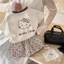 Bộ đồ mùa hè bé gái Hàn Quốc mới hoạt hình phong cách Hồng Kông áo thun ngắn tay + quần short