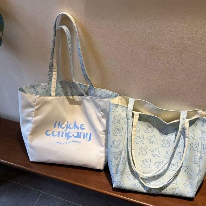 Túi tote đeo vai lười đi lại sức chứa lớn phong cách mới, ba lô hai mặt đa năng xếp li sành đi