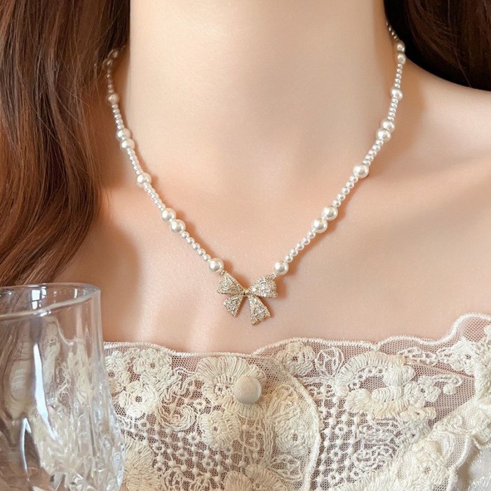 Bow Pendant Pearl Sweater Necklace Women's New High-end Light Luxury Niche Clavicle Necklace A