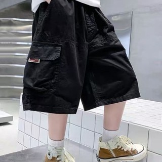 Quần short bé trai mùa hè mới quần trẻ em mùa hè quần vừa và lớn màu nâu cho trẻ em quần yếm
