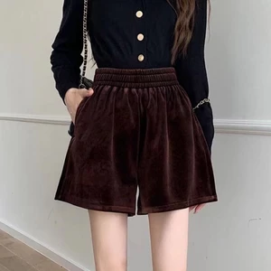 Nhung vàng mùa đông cao cấp bên ngoài mặc rộng chữ A boot quần đen quần short nữ giảm béo eo co giã