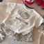 Bộ đồ mùa hè bé gái Hàn Quốc mới hoạt hình phong cách Hồng Kông áo thun ngắn tay + quần short