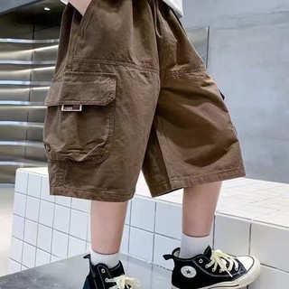 Quần short bé trai mùa hè mới quần trẻ em mùa hè quần vừa và lớn màu nâu cho trẻ em quần yếm