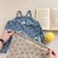 Quần áo trẻ em Hàn Quốc bé gái hoa yếm bé gái cotton mềm mại phong cách phương Tây Áo thun th