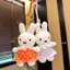 Đồ chơi mềm Miffy với váy chấm bi và dây đeo tay cho du lịch