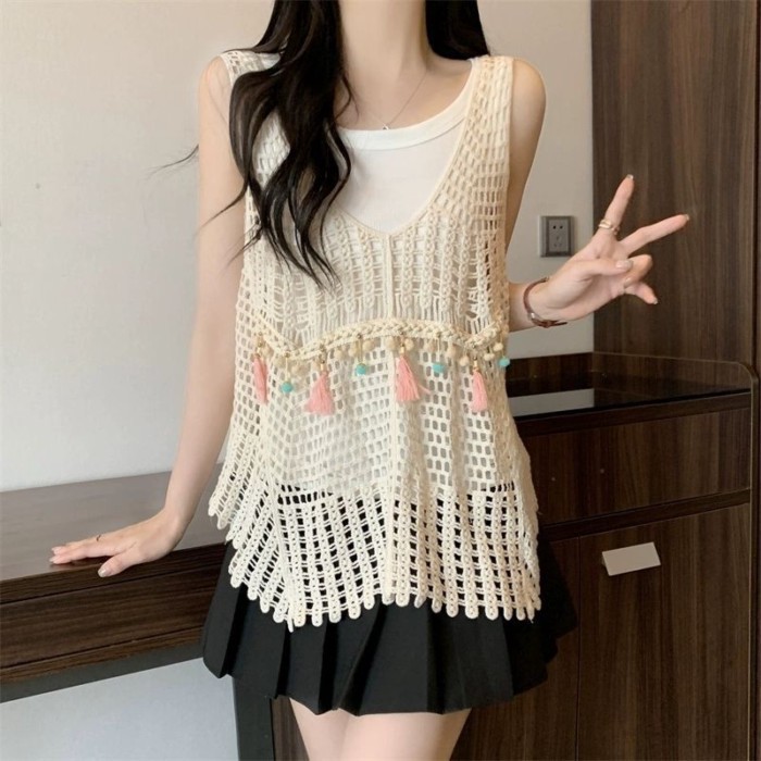 Dây treo rỗng, áo tua rua dáng rộng, áo vest, áo móc hoa xếp chồng phong cách dân tộc cổ điển