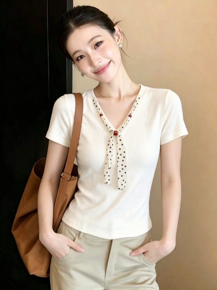 Áo thun ngắn tay cổ chữ V màu trắng phong cách Hàn Quốc dành cho nữ mùa hè phong cách mới niche