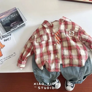 quần áo mùa xuân kẻ sọc trẻ em mới kẻ sọc đỏ mỏng mềm dài tay cho bé trai và bé gái áo sơ mi