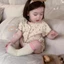 Bộ quần áo mặc nhà màu kem phủ hoa cho bé gái mùa hè mỏng áo ngắn tay và quần dài Bộ hai món pho