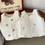 Áo vest trẻ em xuân thu Hàn Quốc chần bông thêu gấu ô liu vest hai mặt cotton nguyên chất áo