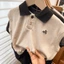 Quần áo trẻ em phong cách Hàn Quốc Áo thun ngắn tay bé trai mùa hè phong cách mới áo vest cot