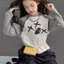 Áo thun dài tay bé gái phong cách mới áo raglan tay áo trẻ em phong cách Hàn Quốc vừa và lớn áo