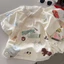 Áo thun trẻ em cotton nguyên chất phong cách graffiti hoạt hình ve áo ngắn tay mùa hè thời tr
