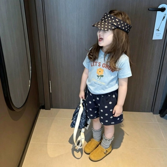 Bộ đồ bé gái phong cách Hàn Quốc mới bé gái in hoa in chữ mềm áo sáp chấm bi quần short hai mảnh