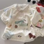 Áo thun trẻ em cotton nguyên chất phong cách graffiti hoạt hình ve áo ngắn tay mùa hè thời tr