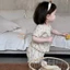 Bộ quần áo mặc nhà màu kem phủ hoa cho bé gái mùa hè mỏng áo ngắn tay và quần dài Bộ hai món pho