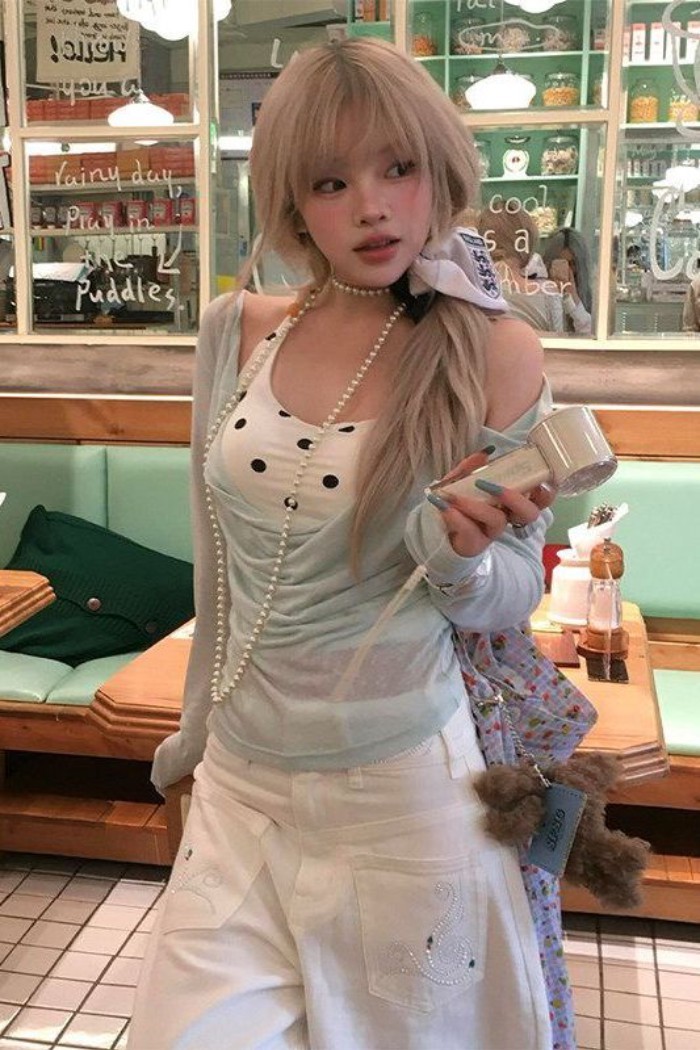 Áo sơ mi dài tay cổ xòe màu xanh bạc hà hơi xuyên thấu dành cho nữ có miếng lót áo ngực cài s