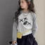 Áo thun dài tay bé gái phong cách mới áo raglan tay áo trẻ em phong cách Hàn Quốc vừa và lớn áo