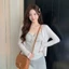 Bộ hai dây sọc treo phong cách Hàn Quốc dành cho nữ mùa hè mới màu trơn áo cardigan chống nắn