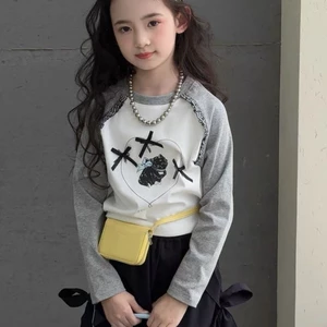 Áo thun dài tay bé gái phong cách mới áo raglan tay áo trẻ em phong cách Hàn Quốc vừa và lớn áo