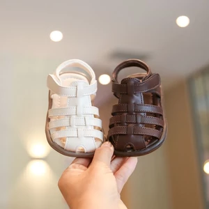 Giày Sandal La Mã Trẻ Em Phong Cách Hàn Quốc Mùa Hè Mới Cho Bé Trai Bao Đầu Đế Mềm Chống Trơn Tr