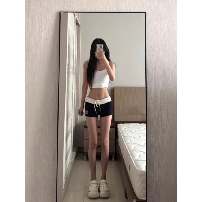 Quần short cạp thấp của Mỹ giảm béo quần thể thao thông thường thiết kế quần ôm ba điểm nóng