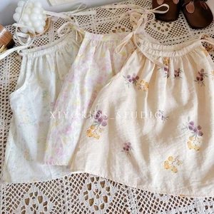 bé gái mùa hè mới thời trang nhỏ dây rút đa năng hoa không tay áo vest mỏng quần áo bé gái