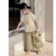 bộ đồ mỏng bé gái mùa xuân hè phong cách mới ba tầng xếp nếp ngắn tay ống rộng quần chín điểm dà
