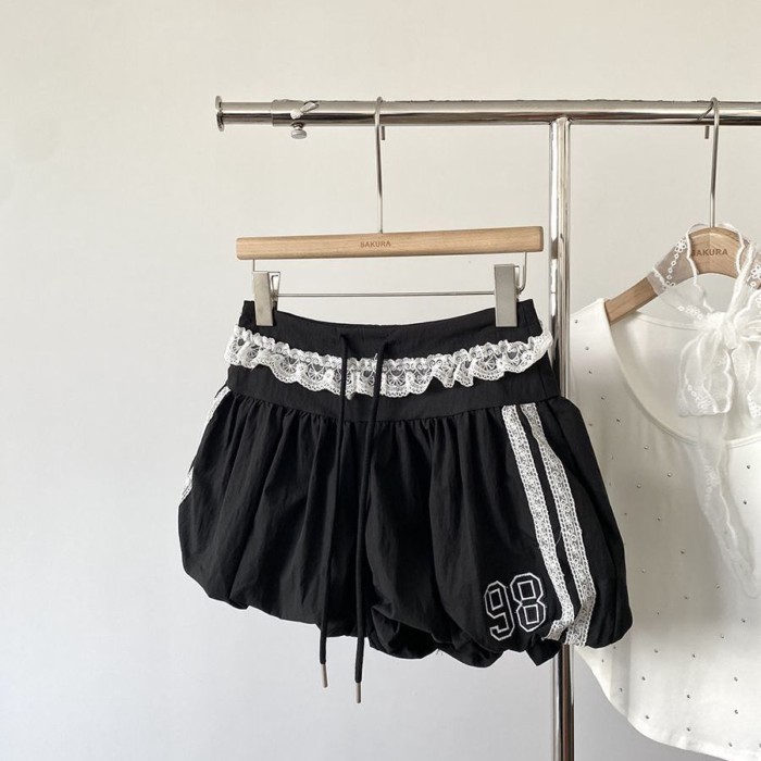 mùa hè mới phong cách Hàn Quốc thời trang eo thun ren nối ren in kỹ thuật số quần short thông th