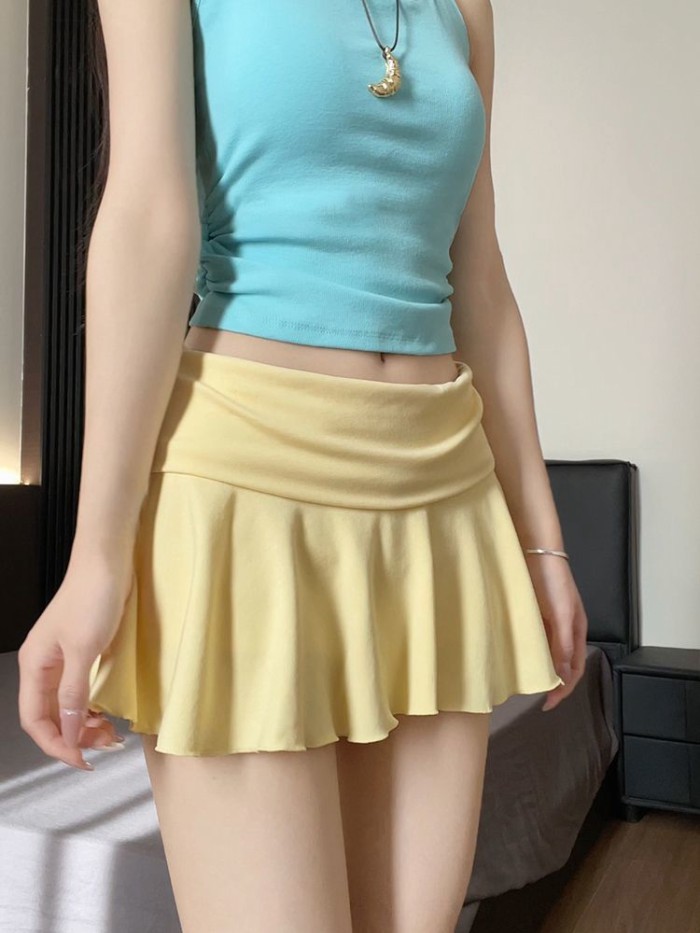 Váy tennis thể thao màu vàng  dành cho nữ váy xếp ly eo cao váy ngắn chống lộ phong cách Mỹ