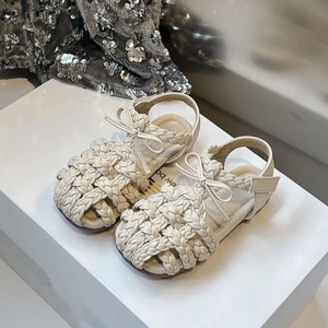 Bé Gái Đầm Công Chúa Giày Bé Rỗng Giày Sandal Mùa Hè Nữ Mới Nơ La Mã Giày Đế Mềm Giày Đi Biển