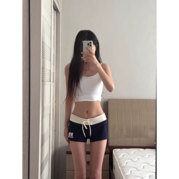Quần short cạp thấp của Mỹ giảm béo quần thể thao thông thường thiết kế quần ôm ba điểm nóng