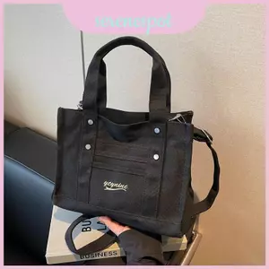 Túi vải cầm tay hợp thời trang có cấu trúc mềm mại và trang phục bỏ túi có dây kéo cho mùa xuân