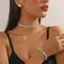Bộ sưu tập trang sức bằng hợp kim lấp lánh với bông tai và dây chuyền cổ Cz cho thời trang mùa xuân 2025