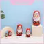 Bộ búp bê ông già Noel làm tổ bằng gỗ với trang trí ngày lễ Giáng sinh và tối giản hiện đại cho phong cách quà tặng