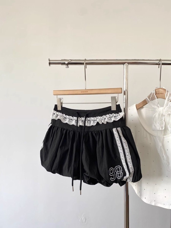 mùa hè mới phong cách Hàn Quốc thời trang eo thun ren nối ren in kỹ thuật số quần short thông th