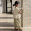 bộ đồ mỏng bé gái mùa xuân hè phong cách mới ba tầng xếp nếp ngắn tay ống rộng quần chín điểm dà